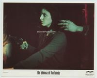 d308 SILENCE OF THE LAMBS color 8x10 movie still '90 close up of Jodie Foster with gun in the dark!
