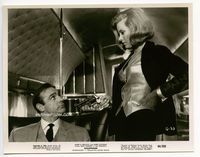 1b107 GOLDFINGER 8x10 movie still '64 sexy Honor Blackman holds gun on seated Sean Connery!