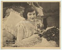 1h364 WHISPERS 8x10 lobby card '20 great smiling portrait of Elaine Hammerstein in bed with roses!