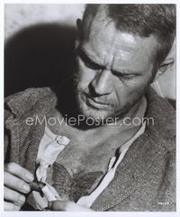 1h236 PAPILLON 8x9.75 movie still '73 super close up of Steve McQueen showing his butterfly tattoo!