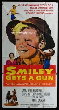 1m571 SMILEY GETS A GUN three-sheet '59 heat-warming Aussie boy Keith Calvert is the new Smiley!