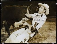1t044 COWBOY FROM BROOKLYN deluxe 10.25x13 '38 close up of Dick Powell attacked by charging bull!