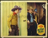 1w119 DESERT TRAIL movie lobby card R39 cowboy John Wayne about to get ambushed by bad guys!