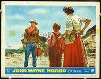 1w181 HONDO movie lobby card #7 '53 3-D, John Wayne standing full-length with rifle by woman & boy!