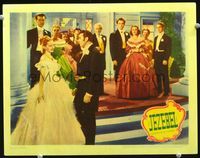 1w204 JEZEBEL lobby card '38 George Brent romances Bette Davis as Henry Fonda & crowd looks on!