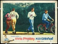 1w207 KID GALAHAD lobby card '62 boxer Elvis Presley runs and is paced by Charles Bronson on bike!