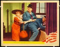 1w260 NOTHING BUT TROUBLE movie lobby card #3 '45 Stan Laurel & Oliver Hardy escape through window!
