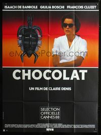 2a293 CHOCOLAT French one-panel '88 a film by Claire Denis set in West Africa, cool tribal mask!