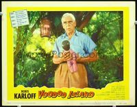 2n249 VOODOO ISLAND lobby card #7 '57 great close up of scared Boris Karloff holding child's doll!