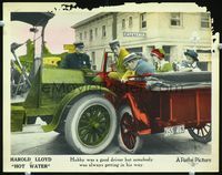 2v133 HOT WATER lobby card '24 cool image of Harold Lloyd & family in car after crash, cop looks on!
