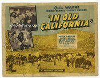 2v519 IN OLD CALIFORNIA TC '42 big John Wayne drinking from bottle, wagon train in huge valley!