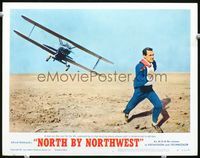 2v195 NORTH BY NORTHWEST LC #6 R66 close up of Cary Grant running from cropduster, Alfred Hitchcock