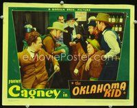 2v203 OKLAHOMA KID lobby card '39 close image of James Cagney punching Ward Bond while men look on!