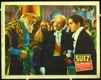 2v255 SUEZ movie lobby card '38 Tyrone Power at fancy ball in tuxedo with Egyptian man in fez!