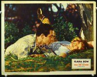 3b305 CALL HER SAVAGE LC '32 great close up of carefree Clara Bow laying on ground in the woods!