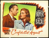 3b329 CONFIDENTIAL AGENT lobby card '45 great close up of Charles Boyer & super sexy Lauren Bacall!