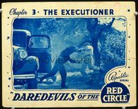3b344 DAREDEVILS OF THE RED CIRCLE chap 3 LC '39 Republic serial, guys fighting on road by car!