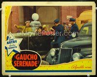3b390 GAUCHO SERENADE movie lobby card '40 Gene Autry & Smiley Burnette in car stopped by police!