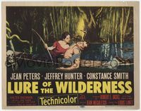 3b145 LURE OF THE WILDERNESS TC '52 art of sexy Jean Peters holding wounded Jeff Hunter in swamp!