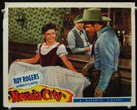 3b511 NEVADA CITY movie lobby card '41 Roy Rogers admires sexy Sally Payne's dress in bar!