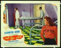 3b531 OTHER LOVE movie lobby card #7 '47 Barbara Stanwyck watches men wheeling body into morgue!