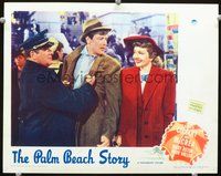 3b536 PALM BEACH STORY LC '42 great c/u of cop grabbing Joel McCrea as Claudette Colbert laughs!