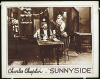3b629 SUNNYSIDE movie lobby card R20s Charlie Chaplin juggling food & serving breakfast in cabin!
