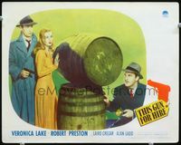 3b644 THIS GUN FOR HIRE LC '42 great image of Alan Ladd with gun & sexy Veronica Lake by barrels!