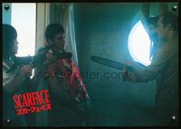 3h244 SCARFACE Japanese '83 close up of Al Pacino held captive by guys with chainsaw & huge gun!