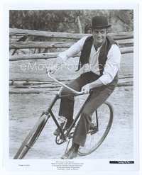 3m066 BUTCH CASSIDY & THE SUNDANCE KID 8x10 '69 great c/u of Paul Newman smiling & riding bicycle!