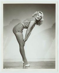 3m080 CLEO MOORE 8x10 still '50s sexiest smiling portrait in tiny outfit touching hands to knees!