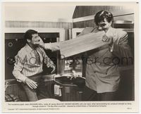 3m398 SPY WHO LOVED ME 8x10 still '77 great c/u of Richard Kiel holding Roger Moore & biting board!