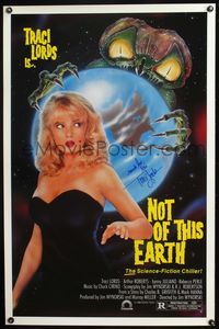 3u400 NOT OF THIS EARTH signed 1sheet '88 autographed by Traci Lords, cool alien holding Earth art!