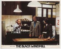 3y025 BLACK WINDMILL color 8x10 movie still #4 '74 Michael Caine watches Donald Pleasance shoot gun!