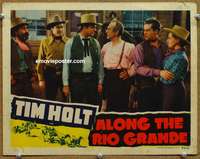 4b054 ALONG THE RIO GRANDE lobby card '41 Tim Holt saves Betty Jane Rhodes and the town in western!