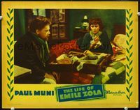 4b588 LIFE OF EMILE ZOLA LC '37 close up of Paul Muni watching Erin O'Brien-Moore pack her suitcase!