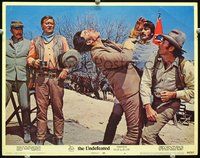 4b915 UNDEFEATED movie lobby card #4 '69 John Wayne, Rock Hudson watch fistfight!