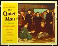 4c632 QUIET MAN lobby card #4 '51 John Wayne & Victor McLaglen clasp hands while sitting on ground!