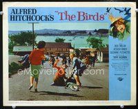 4f456 BIRDS movie lobby card #4 '63 Alfred Hitchcock, terrified villagers flee down city road!
