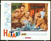 4f643 HATARI lobby card #1 '62 John Wayne reads letter as Red Buttons & Elsa Martinelli look on!