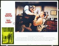 4f857 RIO LOBO lobby card #4 '71 wacky image of John Wayne getting tooth pulled without anesthesia!
