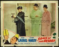 4f895 SONS OF THE DESERT LC R45 close up of policeman with Stan Laurel & Oliver Hardy in jammies!