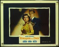 4f917 STRANGERS ON A TRAIN LC #7 '51 Robert Walker with his gloved hands on Ruth Roman's shoulders!