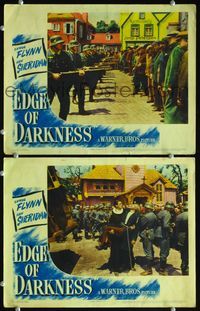 4g207 EDGE OF DARKNESS 2 lobby cards '42 line of German soldiers about to open fire on civilians!