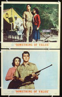 4g717 SOMETHING OF VALUE 2 movie lobby cards '57 cool images of Rock Hudson w/rifle, Dana Wynter!