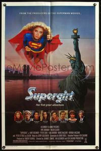 5e759 SUPERGIRL 1sh '84 super Helen Slater in costume flying over Statue of Liberty!