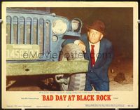 5f353 BAD DAY AT BLACK ROCK LC#3 '55 Spencer Tracy with bad arm crouches behind jeep in desert!