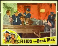 5f356 BANK DICK LC#5 R49 Grady Sutton & police help W.C. Fields from car after chase!