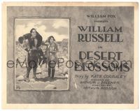 5f124 DESERT BLOSSOMS TC '21 William Russell holds young boy on shoulders in desert with Ferguson!