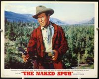5f717 NAKED SPUR photolobby '53 great close up of tough James Stewart with two guns drawn!